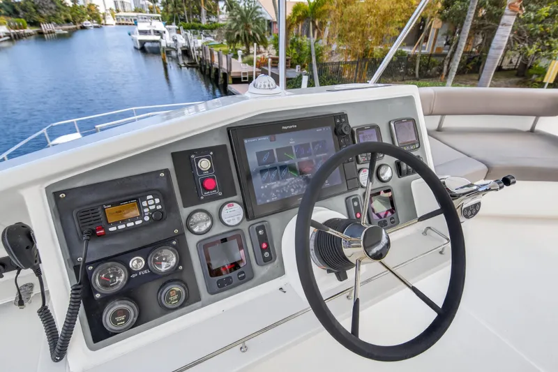 Slide: The Image of Helm of 2016 Leopard 51 Powercat with navigation controls and steering wheel. - 35