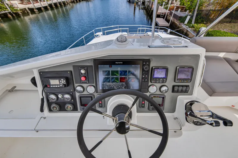 Slide: The Image of Helm of 2016 Leopard 51 Powercat with navigation controls and steering wheel. - 36