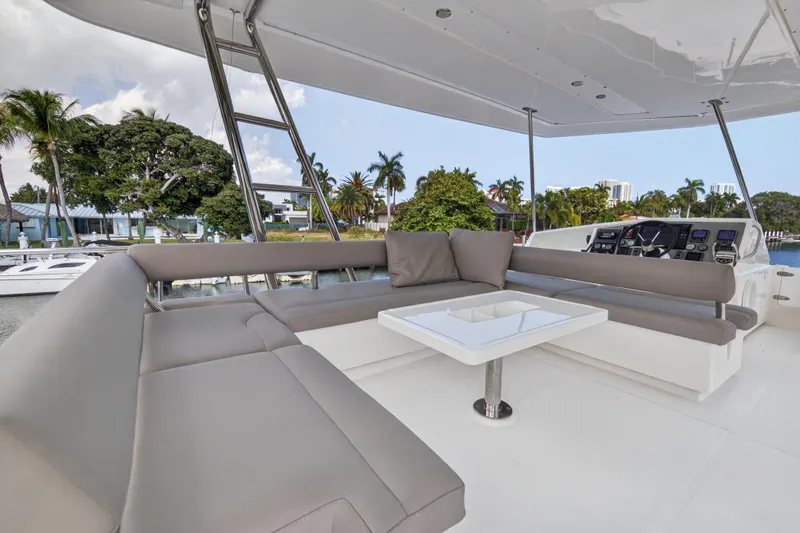 Slide: The Image of Luxurious 2016 Leopard 51 Powercat yacht interior with plush seating and modern helm. - 39