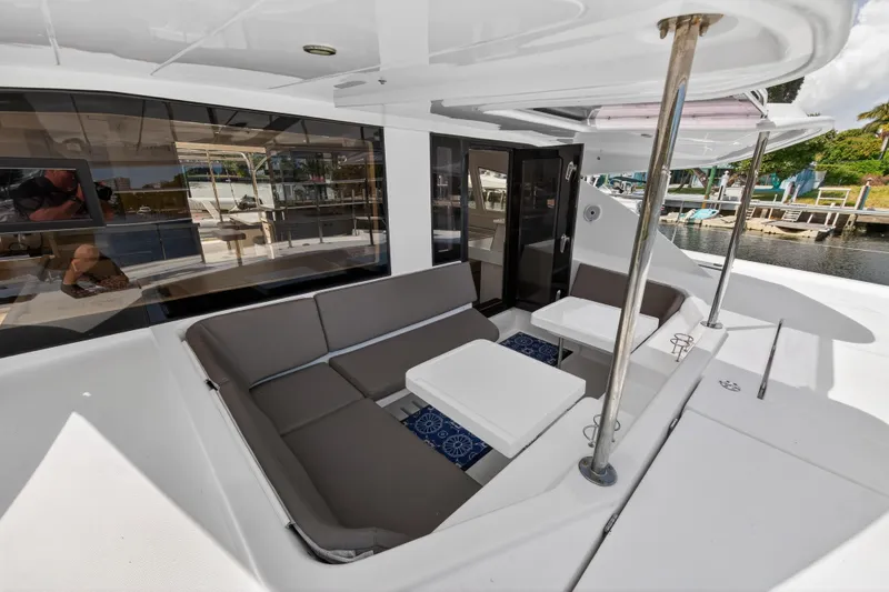 Slide: The Image of 2016 Leopard 51 Powercat yacht with spacious outdoor seating area and modern design. - 59