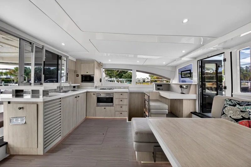 Slide: The Image of Modern interior of 2016 Leopard 51 Powercat yacht with spacious kitchen and dining area. - 71
