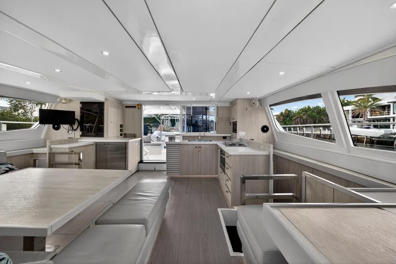 Slide: The Image of Interior of 2016 Leopard 51 Powercat yacht with modern kitchen and seating area. - 73