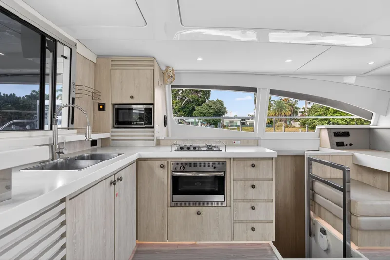 Slide: The Image of Modern kitchen interior of 2016 Leopard 51 Powercat yacht with sleek design and appliances. - 75