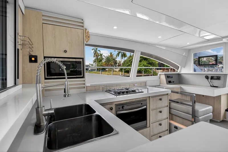 Slide: The Image of Modern kitchen interior of 2016 Leopard 51 Powercat yacht with sleek design and appliances. - 76