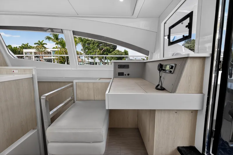 Slide: The Image of Interior of 2016 Leopard 51 Powercat yacht with modern seating and control panel. - 87