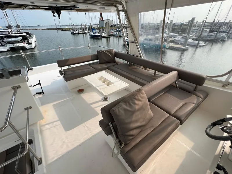 Slide: The Image of 2016 Leopard 51 Powercat yacht interior with seating and helm station. - 9