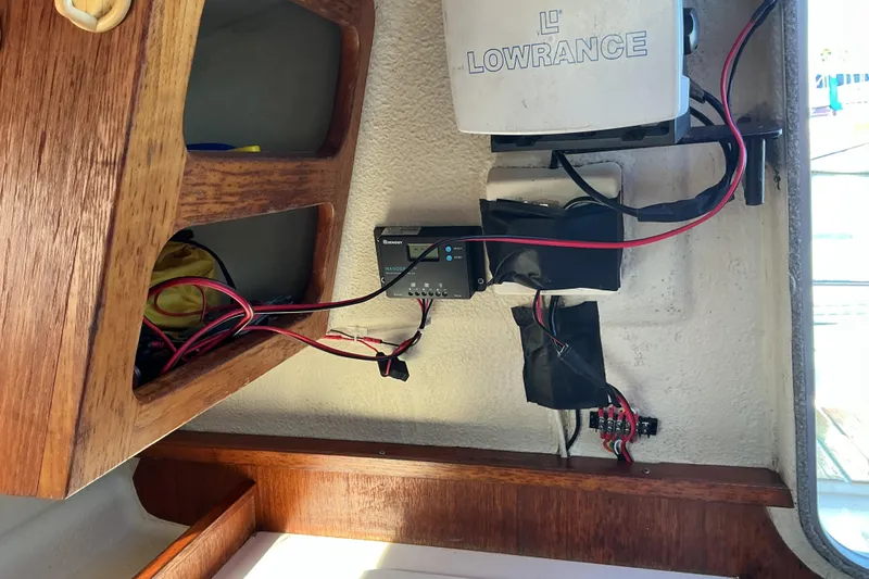 Slide: The Image of Boat interior with Lowrance equipment and wiring, Dragonfly 800 Swing Wing, 1992 model. - 34