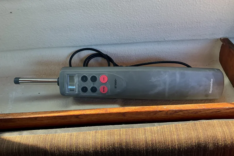 Slide: The Image of Handheld device with buttons and display, Raymarine ST1000+, on a Dragonfly 800 Swing Wing, 1992. - 38