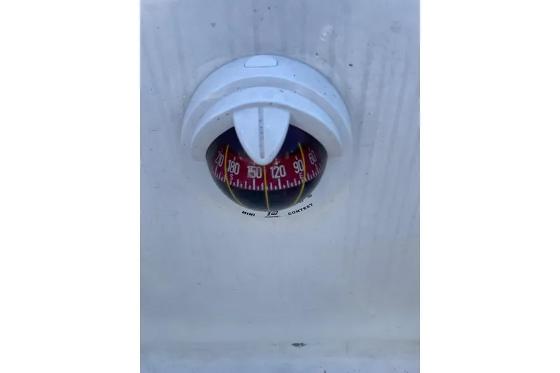 Slide: The Image of Compass on Dragonfly 800 Swing Wing, 1992 model, showing directional degrees. - 56