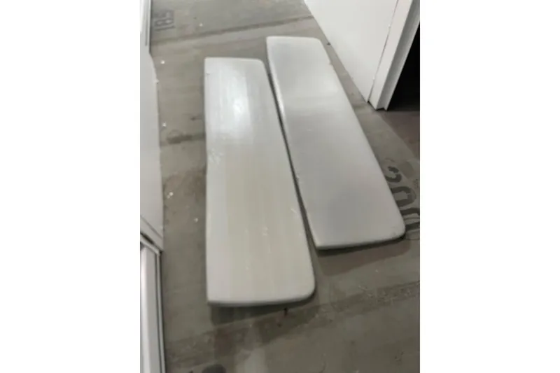 Slide: The Image of Two Dragonfly 800 Swing Wing panels from 1992 on a concrete floor. - 57