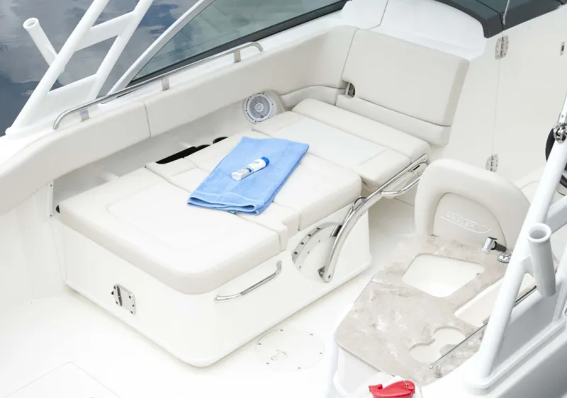 Slide: The Image of Manufacturer Provided Image: 2016 Boston Whaler 230 Vantage boat with passengers cruising on the water. - 9