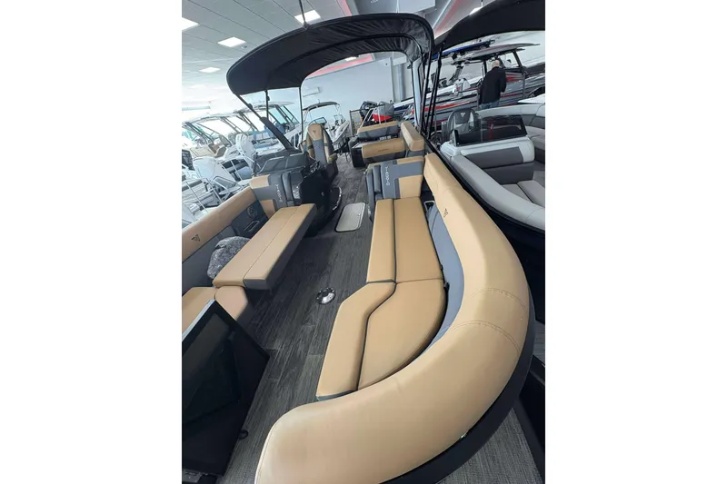 Slide: The Image of Luxurious 2026 Viaggio Z24B pontoon boat interior with tan seating and modern design. - 14