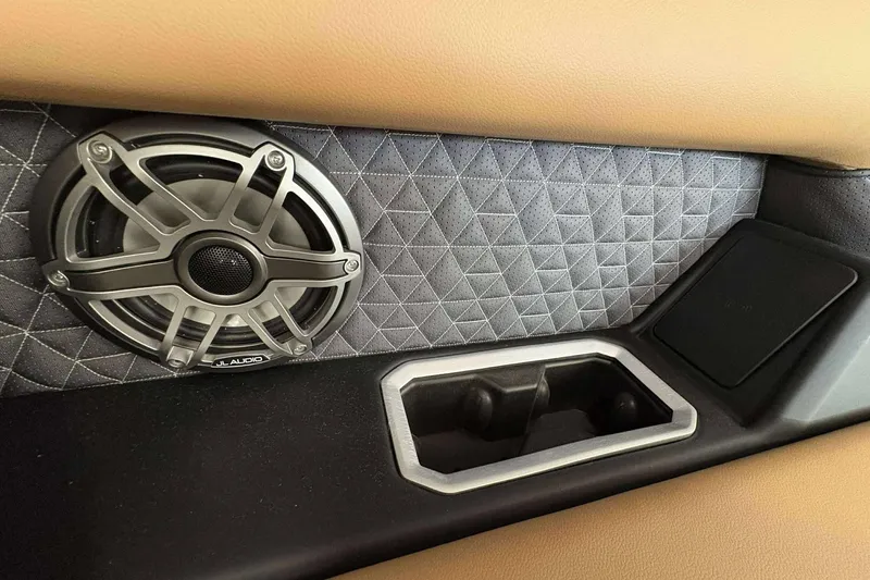 Slide: The Image of Interior of 2026 Viaggio Z24B featuring JL Audio speaker and quilted panel design. - 15