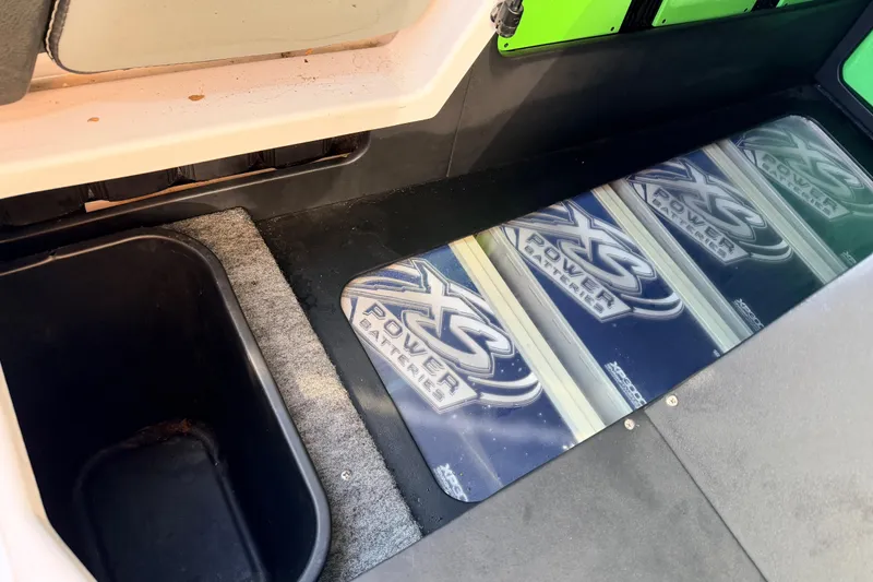 Slide: The Image of 2014 Nautique Super Air Nautique G23 interior with XS Power batteries visible. - 19