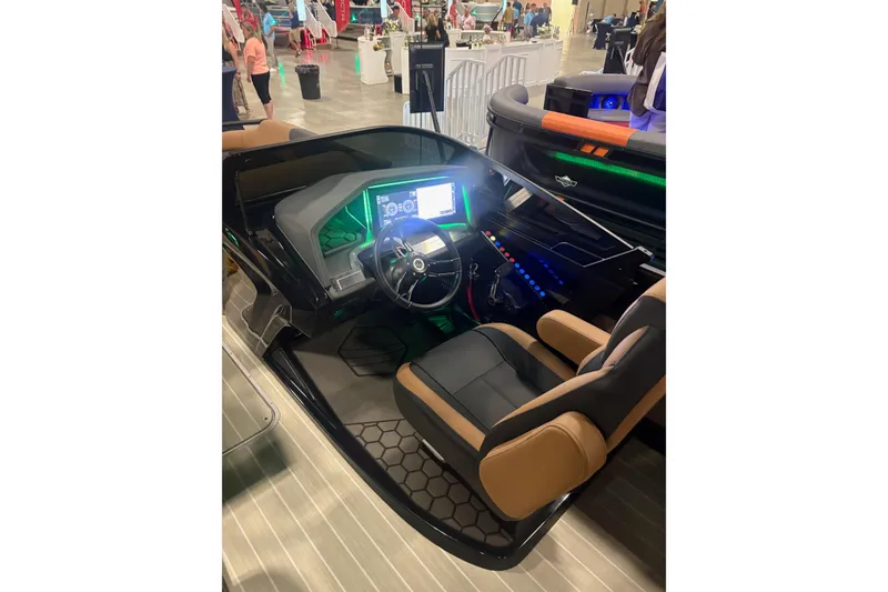 Slide: The Image of 2026 South Bay Sport RS9 DC boat interior with modern dashboard and seating. - 5