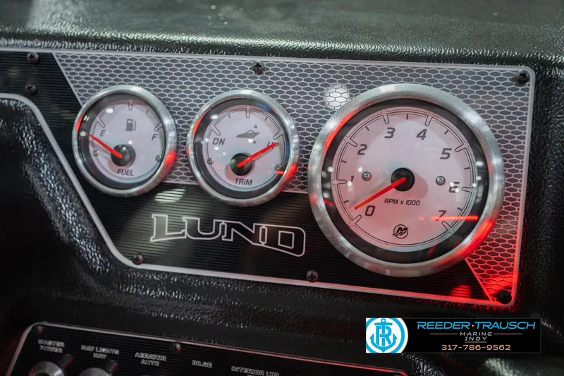 Slide: The Image of Dashboard of 2026 Lund 1875 Crossover XS with wireless charging mount. - 35