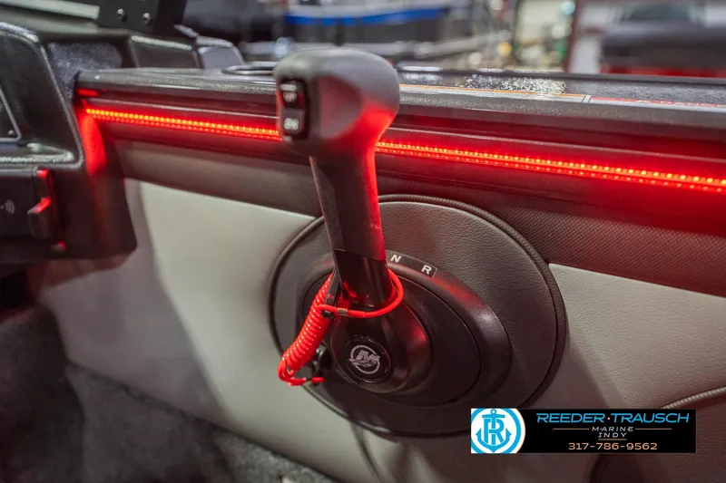 Slide: The Image of 2026 Lund 1875 Crossover XS boat seat with logo, featuring sleek design and stitching. - 38