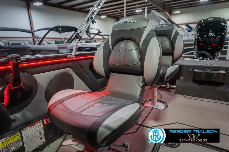 Slide: The Image of 2026 Lund 1875 Crossover XS boat interior with premium seating and modern design. - 39
