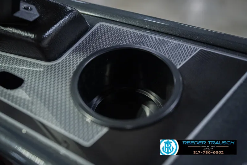 Slide: The Image of 2026 Lund 1875 Crossover XS boat interior with Reeder-Trausch Marine logo. - 44