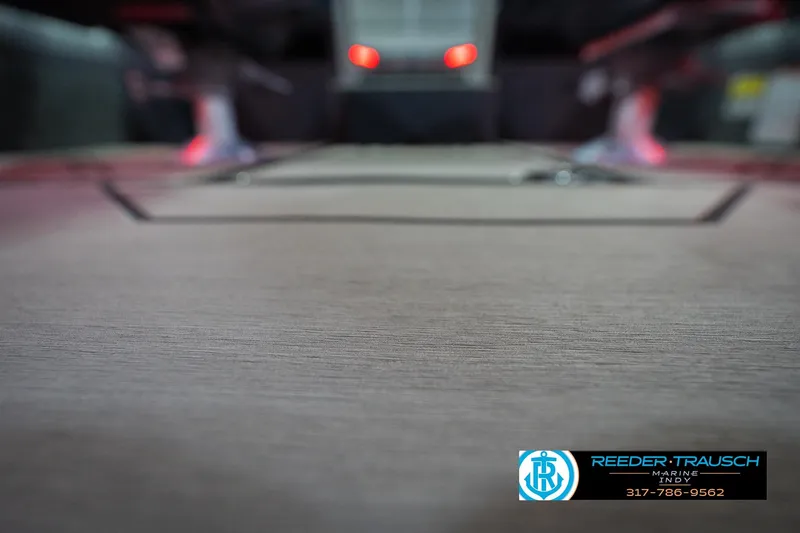 Slide: The Image of Mercury FourStroke engine on 2026 Lund 1875 Crossover XS boat, indoor setting. - 46