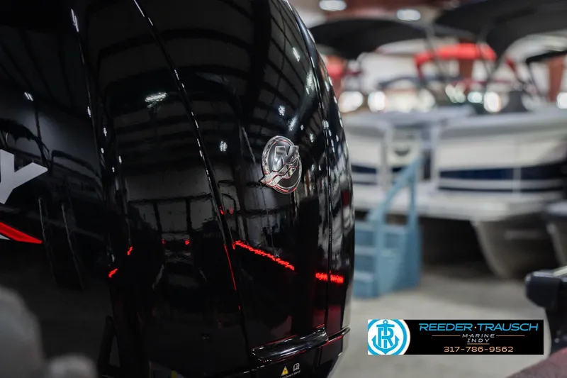 Slide: The Image of 2026 Lund 1875 Crossover XS boat side view with logo and dealership details. - 50