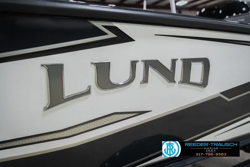 Slide: The Image of Trailer hitch of 2026 Lund 1875 Crossover XS in a garage setting. - 52