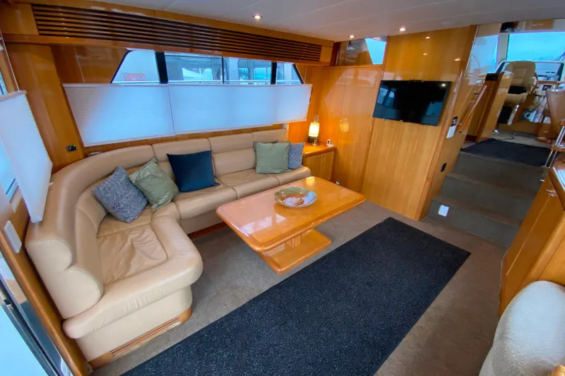 Slide: The Image of Luxurious interior of 2001 Compass 57 yacht with leather seating and modern decor. - 6