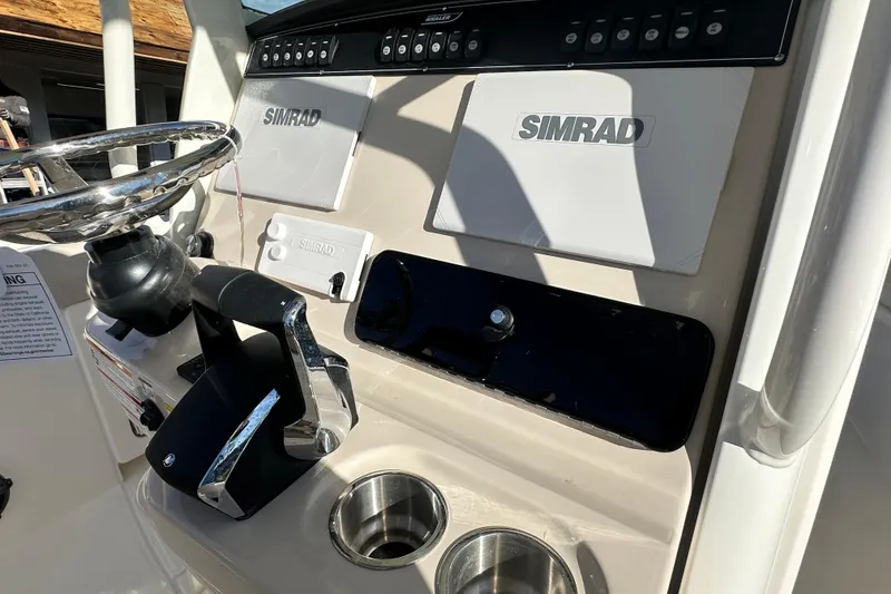 Slide: The Image of Dashboard of 2026 Boston Whaler 280 Outrage with Simrad technology. - 17
