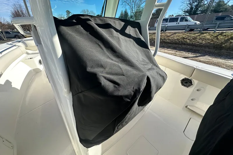 Slide: The Image of 2026 Boston Whaler 280 Outrage with cover outdoors. - 30