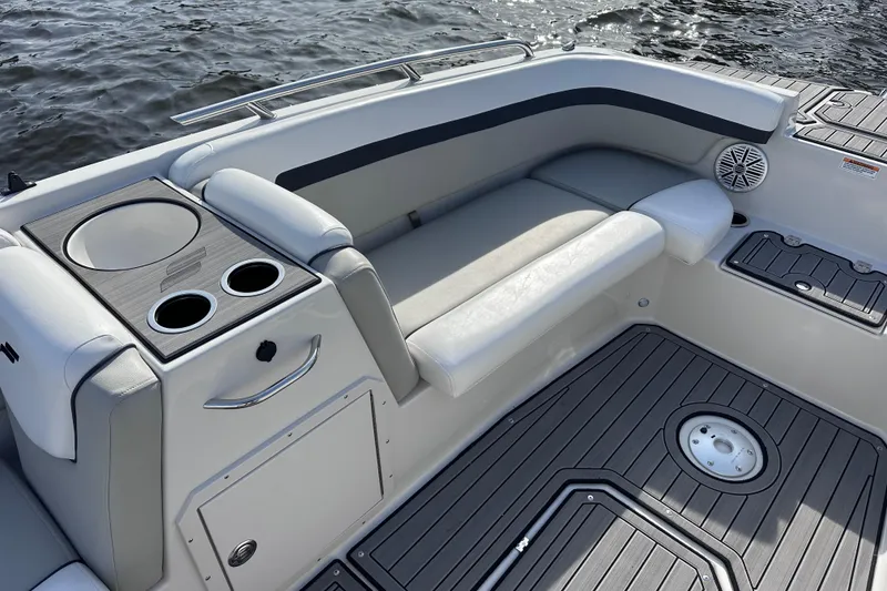 Slide: The Image of 2023 Starcraft SVX 191 OB boat interior with seating and cup holders. - 16