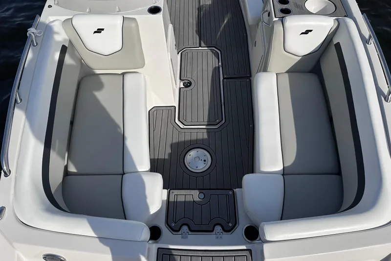 Slide: The Image of 2023 Starcraft SVX 191 OB boat interior with gray seating and deck. - 22