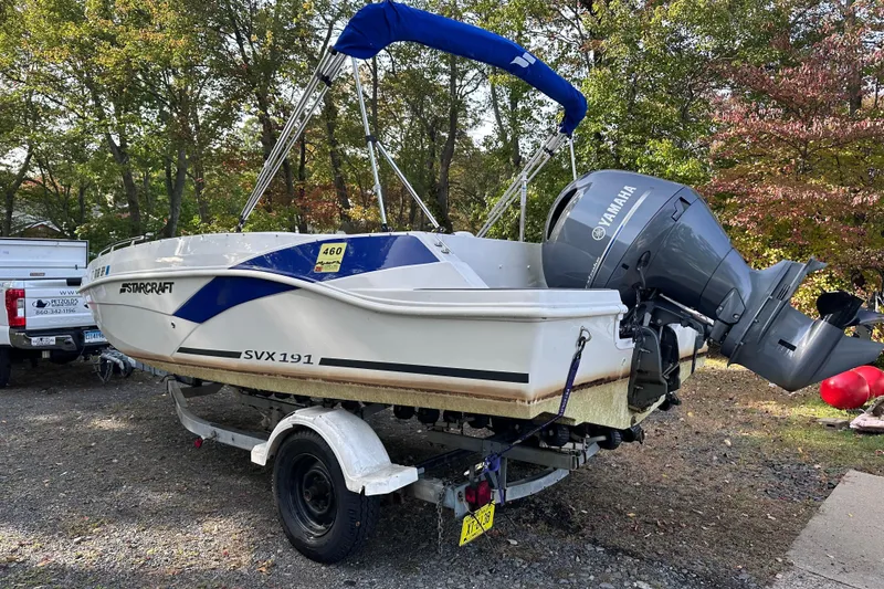 Slide: The Image of 2023 Starcraft SVX 191 OB boat on trailer with Yamaha outboard motor. - 29