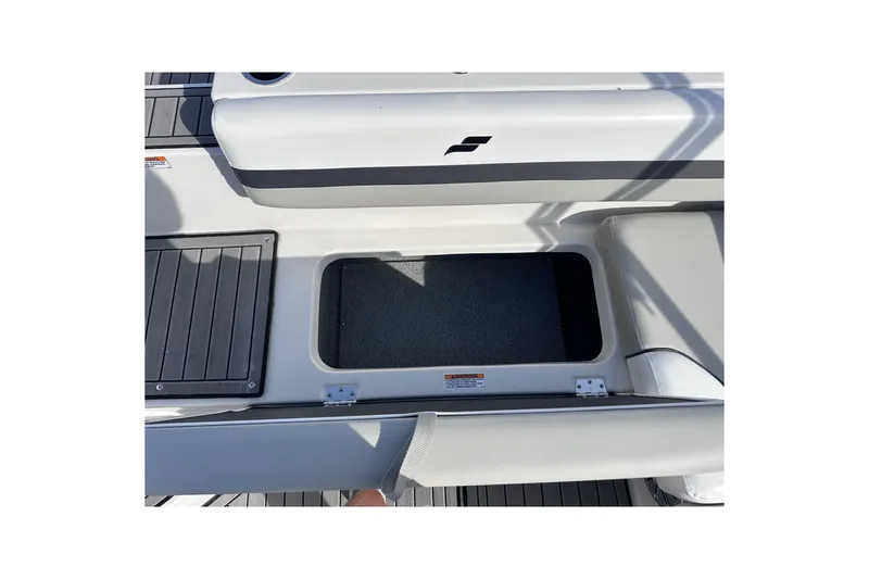 Slide: The Image of 2023 Starcraft SVX 191 OB boat interior storage compartment, open and accessible. - 6