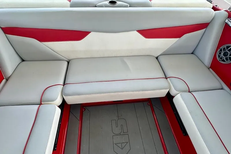 Slide: The Image of 2021 Axis A20 boat interior with red and gray seating. - 30