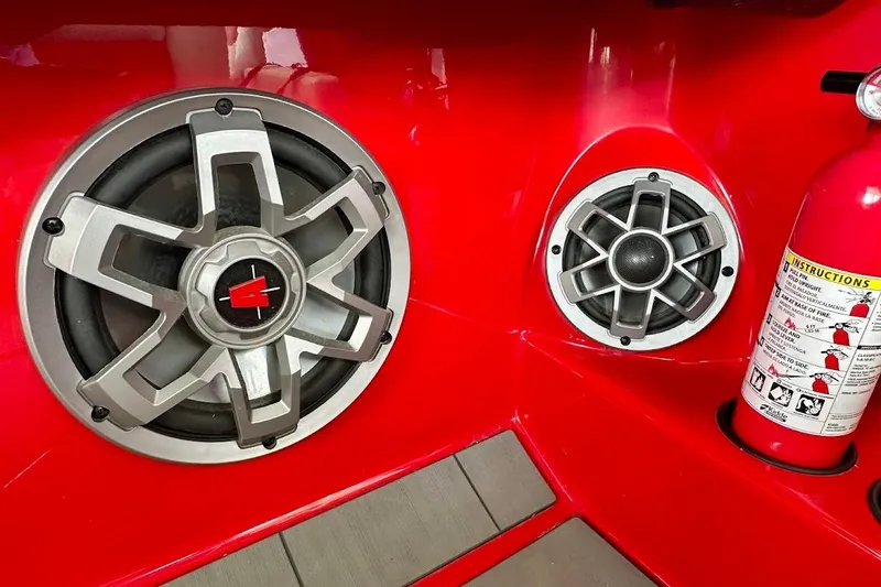 Slide: The Image of Red interior of 2021 Axis A20 with speakers and fire extinguisher. - 38