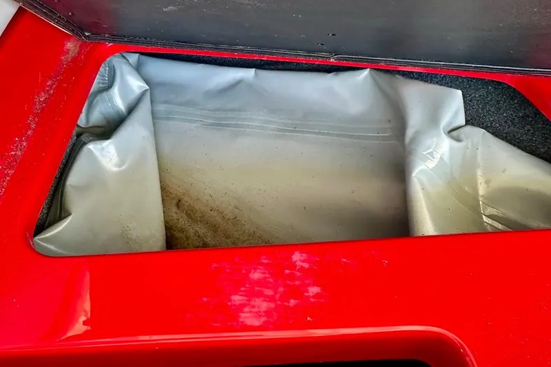 Slide: The Image of Red Axis A20 boat storage compartment with gray lining, 2021 model. - 49