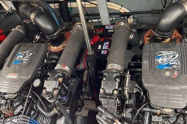 Slide: The Image of Engine compartment of a 2002 Sea Ray 340 Sundancer with twin 6.2 MPI engines. - 71