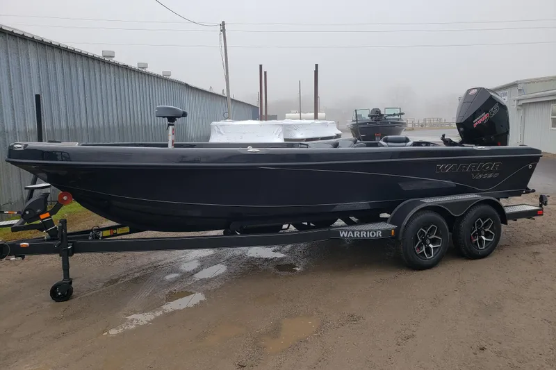 The Image of 2026 Warrior V2090 boat on trailer, parked outdoors on a foggy day. - 1