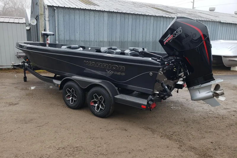 Slide: The Image of 2026 Warrior V2090 boat with powerful outboard motor on a trailer. - 3