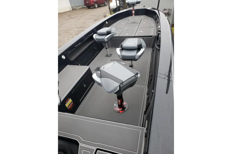 Slide: The Image of 2026 Warrior V2090 boat interior with seating and storage compartments. - 5