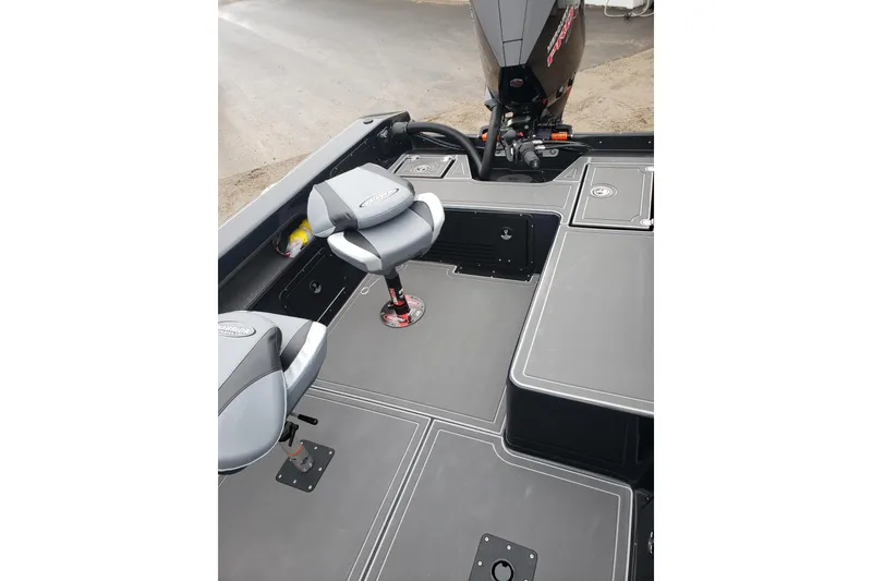 Slide: The Image of 2026 Warrior V2090 boat interior with seating and storage compartments. - 8