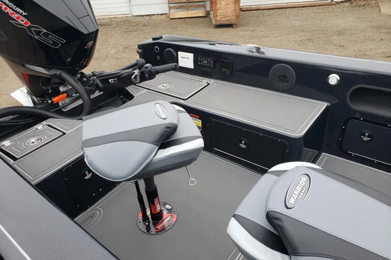 Slide: The Image of 2026 Warrior V2090 boat interior with seating and storage compartments. - 9