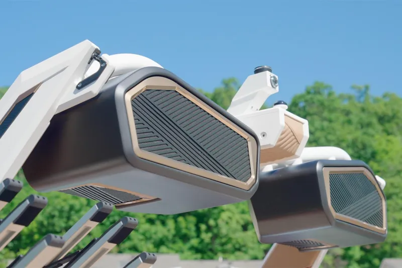 Slide: The Image of Close-up of 2025 MasterCraft XStar 25 boat speakers against a clear blue sky. - 15