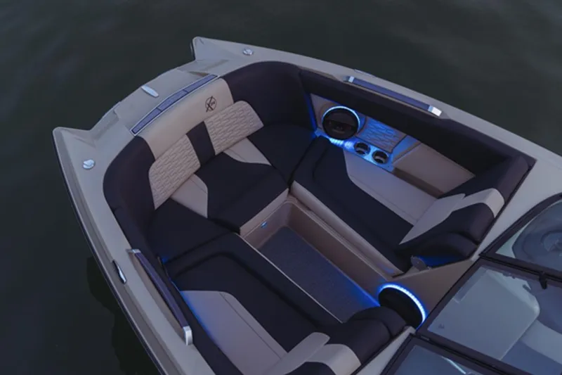 Slide: The Image of Manufacturer Provided Image: 2024 MasterCraft X24 boat interior with luxurious seating and ambient lighting. - 3