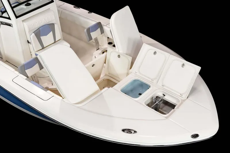 Slide: The Image of Manufacturer Provided Image: 2023 Robalo 266 Cayman boat interior with open storage compartments and seating. - 31
