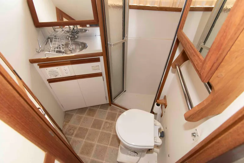 Slide: The Image of Bathroom interior of 1995 Carver 330 Mariner yacht with shower and sink. - 7