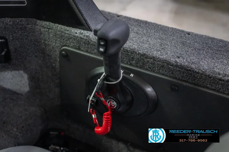 Slide: The Image of 2026 Lund 2075 Impact XS boat throttle control with safety lanyard, Reeder Trausch Marine logo. - 40