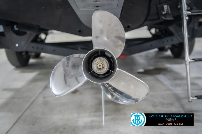 Slide: The Image of Propeller of 2026 Lund 2075 Impact XS boat, displayed indoors. - 53