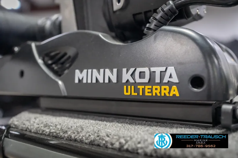 Slide: The Image of Minn Kota Ulterra motor on 2026 Lund 2075 Impact XS boat, Reeder-Trausch Marine logo visible. - 56
