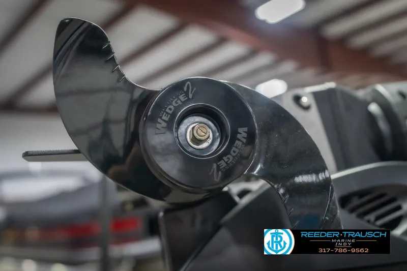 Slide: The Image of Close-up of a 2026 Lund 2075 Impact XS boat component with Wedge 2 logo. - 57